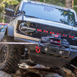 WARN ZEON XD 12-S 12,000 lb truck, Jeep, and SUV winch shown in rocky off-road terrain