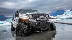 WARN ZEON XP 14-S 14,000 lb truck, Jeep, and SUV winch shown in snowy off-road conditions