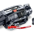 Angled view of the WARN ZEON XC 10-S 10,000 lb truck, Jeep, and SUV winch with 100 ft synthetic rope and hawse fairlead